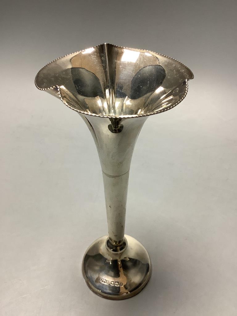 A silver cigarette case, coffee spoons, small bowl, vase and a small modern spoon by Guild of Handicrafts.